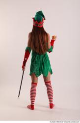 Veronika Elf Pose With Apple